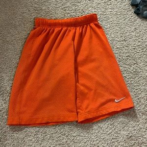 3 pairs of shorts 1 Nike 1 Adidas 1 Academy brand